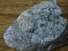 Humite with green Mica and Magnetite, some with rare Clinohumite